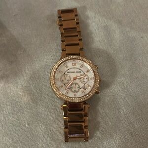 Michael Kors rose gold diamond embezzled watch
